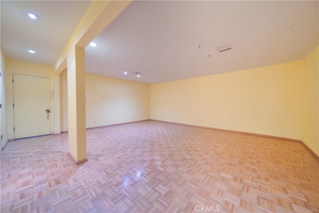 empty room with light parquet floors