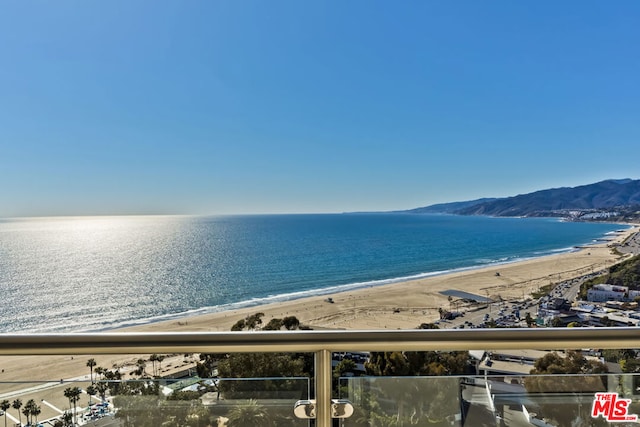 property view of water featuring a beach view