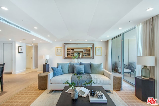 living room with light hardwood / wood-style floors