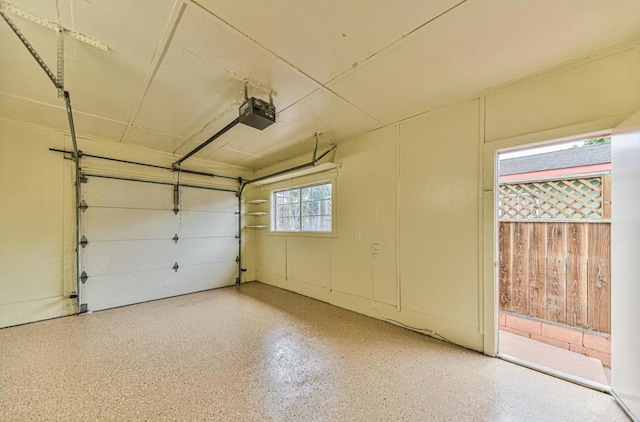 garage featuring a garage door opener