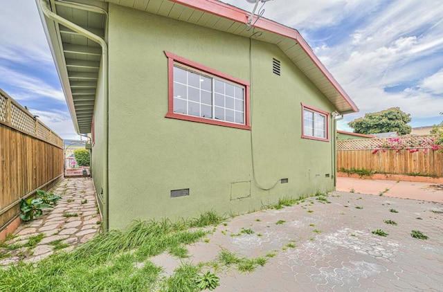 view of home's exterior with a patio area