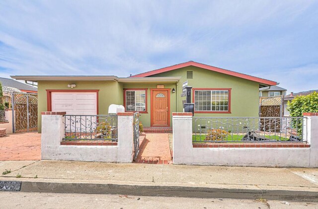 view of front of property featuring a garage