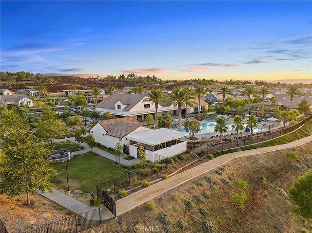 aerial view at dusk with a residential view