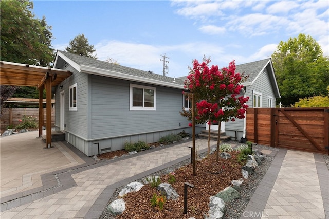 view of home's exterior with a patio