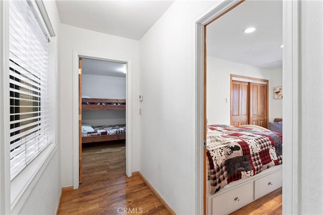 bedroom featuring a closet and hardwood / wood-style flooring