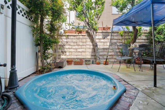 view of swimming pool featuring a patio