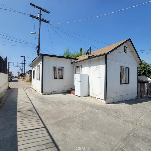 rear view of property with a patio area