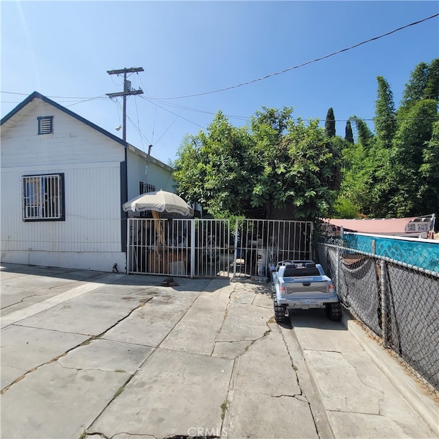 view of patio / terrace featuring a covered pool