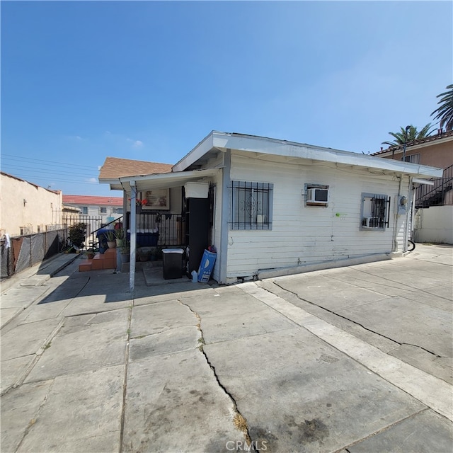 back of property with a patio area