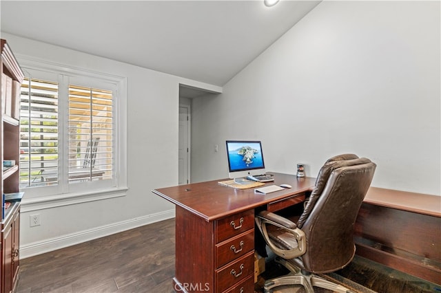 office space featuring vaulted ceiling and dark hardwood / wood-style floors