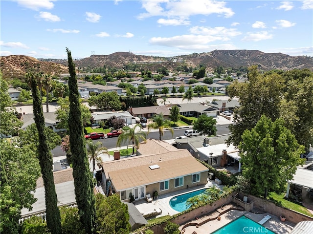 drone / aerial view featuring a mountain view