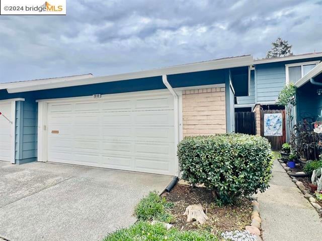 exterior space with a garage