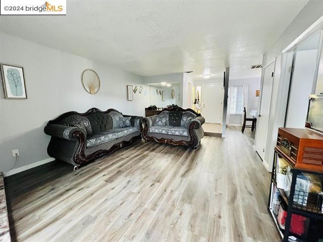 living room with hardwood / wood-style flooring