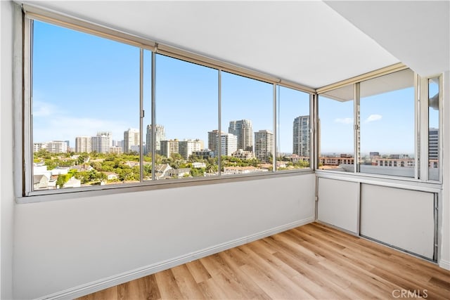 unfurnished sunroom with a healthy amount of sunlight