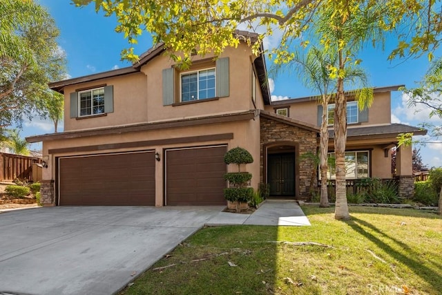 view of front of home featuring a garage and a front lawn