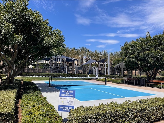 view of swimming pool featuring basketball court and tennis court