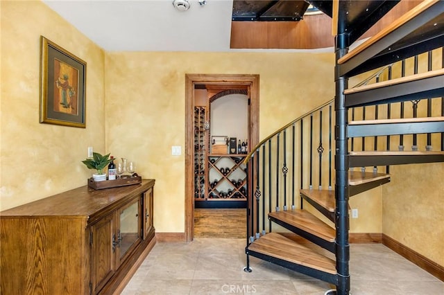 staircase with baseboards