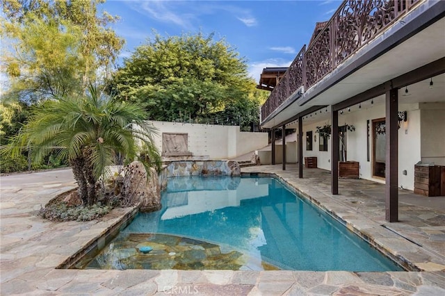 view of pool featuring a patio area