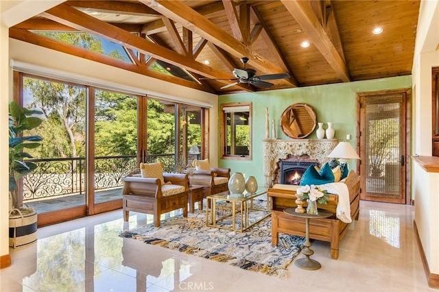 sunroom / solarium featuring wooden ceiling, vaulted ceiling with beams, and ceiling fan