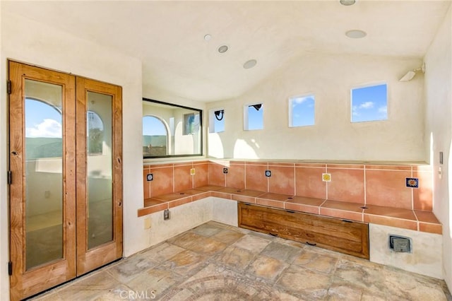 interior space featuring lofted ceiling