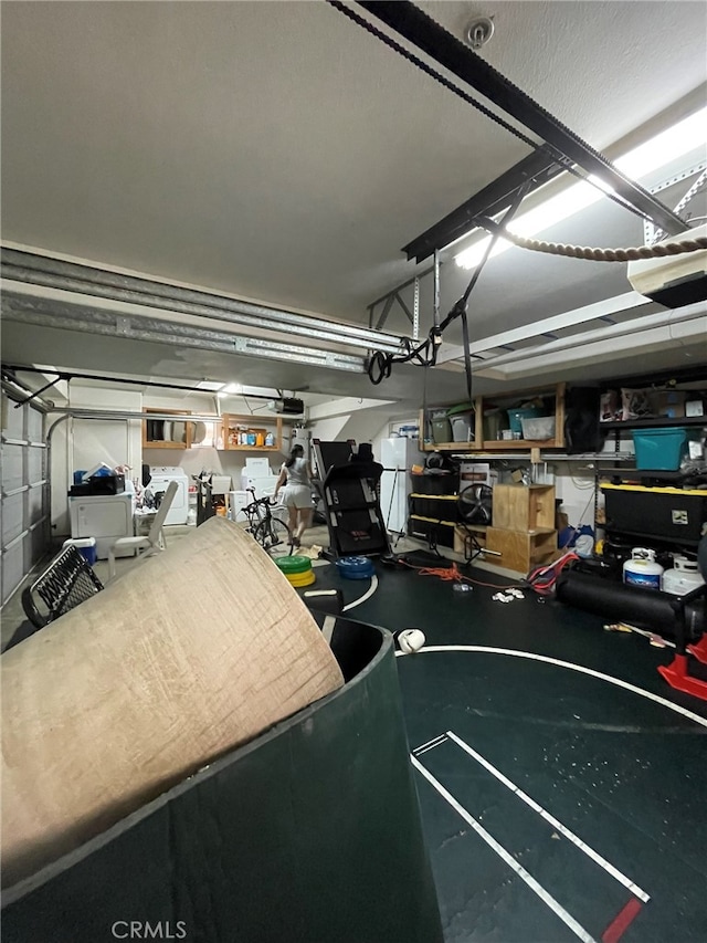 garage featuring a garage door opener