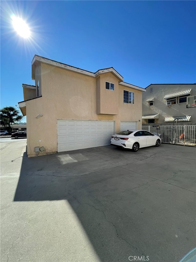 exterior space with a garage