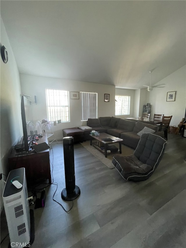 living room with vaulted ceiling and ceiling fan