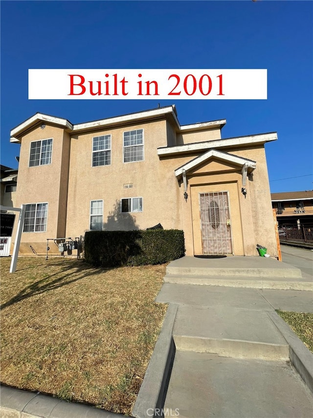 exterior space featuring a front yard