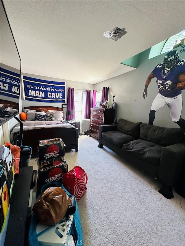 carpeted bedroom with a textured ceiling