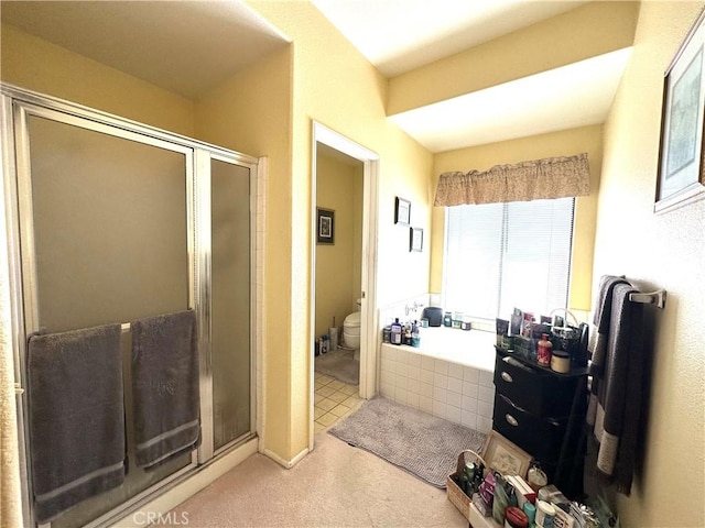 bathroom with tile patterned flooring, plus walk in shower, and toilet