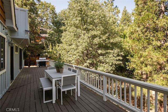 wooden terrace with grilling area