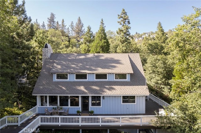 rear view of house with a deck