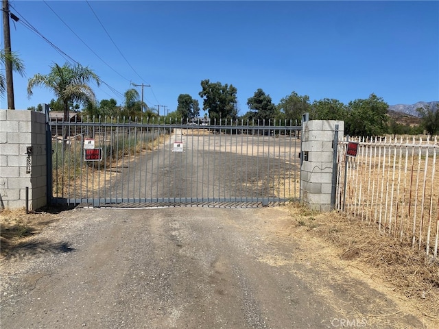 view of gate featuring a rural view