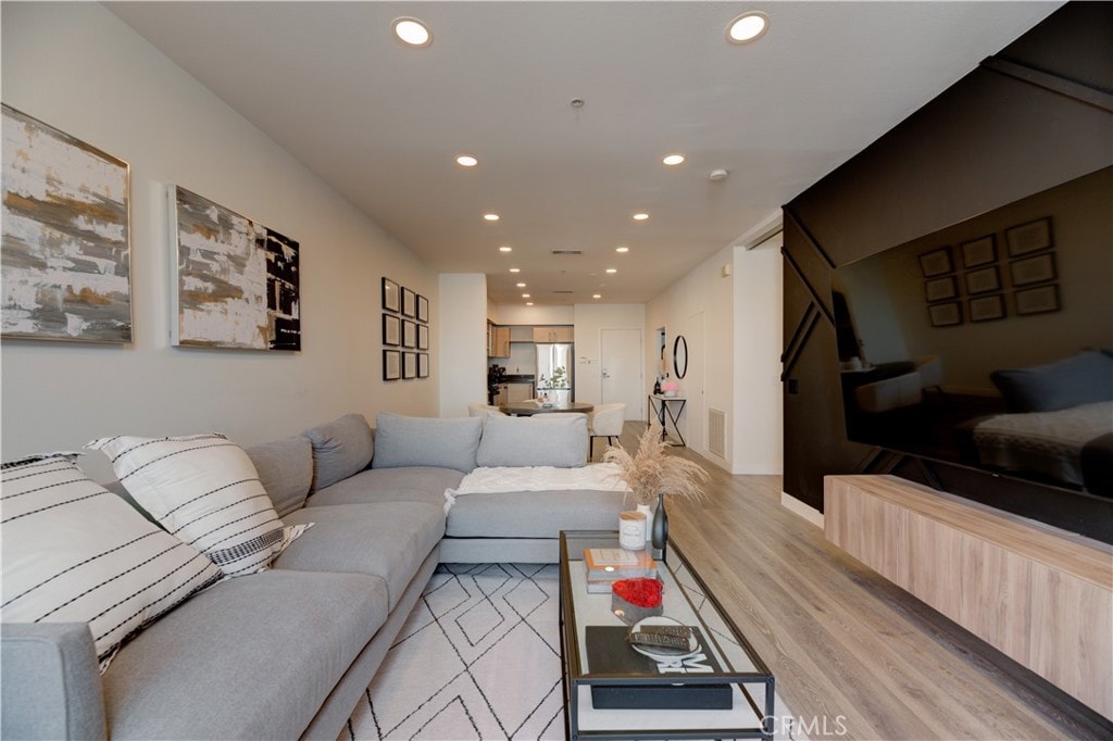 living room with light wood-type flooring