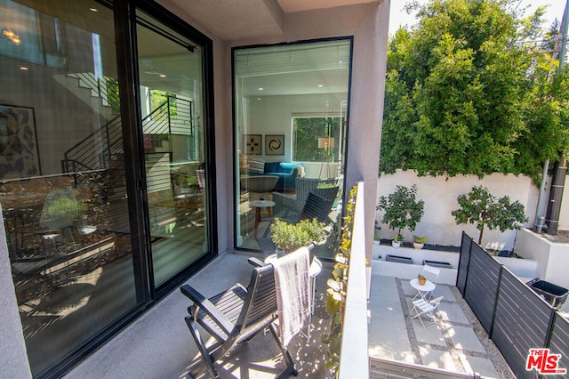 view of patio / terrace featuring a balcony