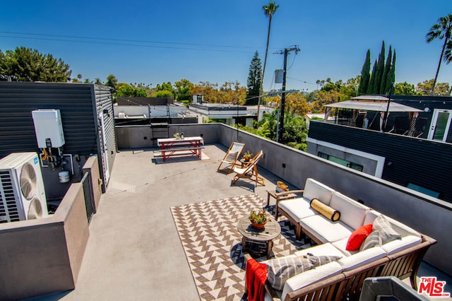 view of patio / terrace with outdoor lounge area and ac unit