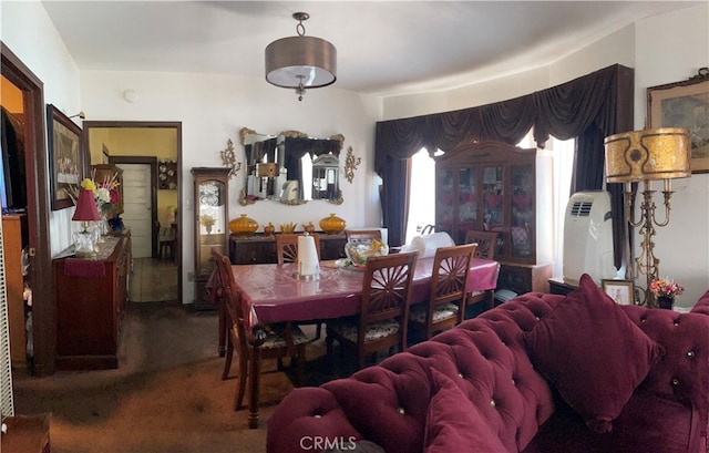 view of carpeted dining space