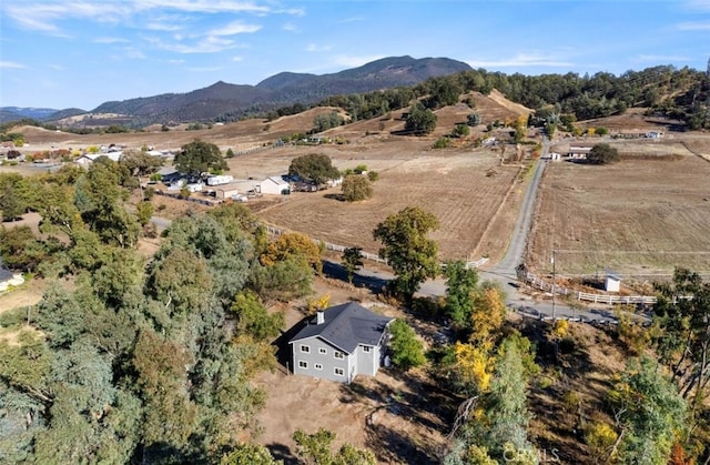 drone / aerial view featuring a mountain view