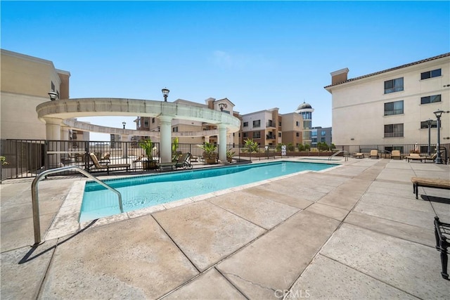 view of pool featuring a patio