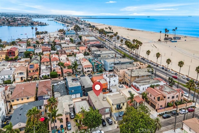 aerial view with a view of the beach and a water view