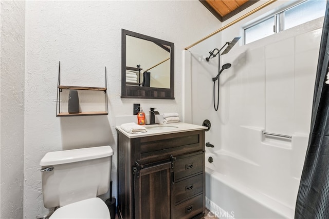 full bathroom with shower / tub combo, vanity, and toilet