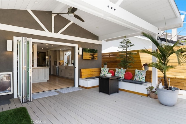 wooden deck with ceiling fan