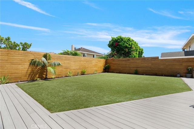 view of yard featuring a wooden deck