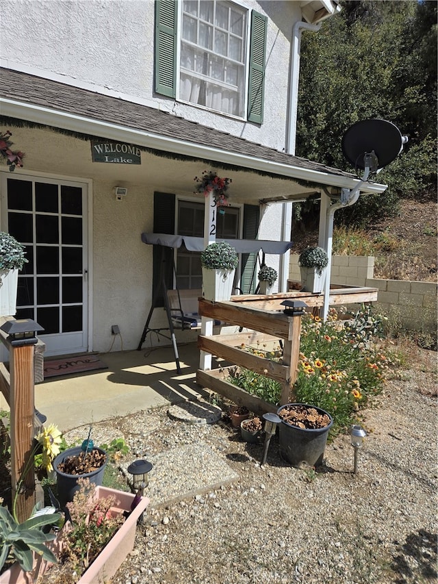 view of patio featuring a porch