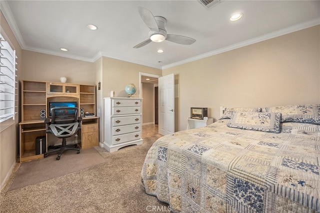 carpeted bedroom with ceiling fan and crown molding