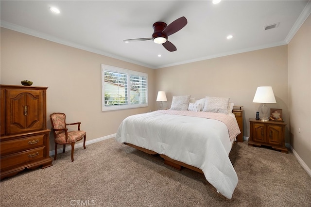 carpeted bedroom featuring crown molding and ceiling fan