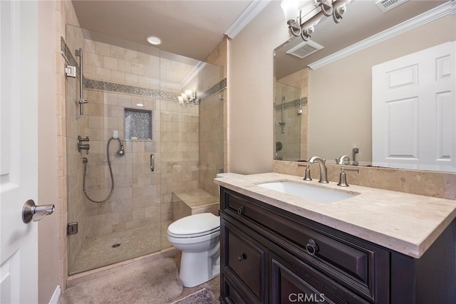 bathroom featuring walk in shower, crown molding, vanity, and toilet