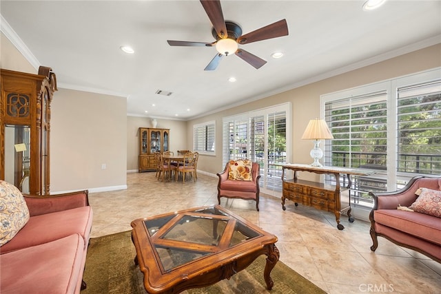 tiled living room featuring crown molding, ceiling fan, and a wealth of natural light