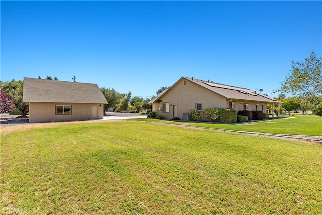 view of property exterior with a yard