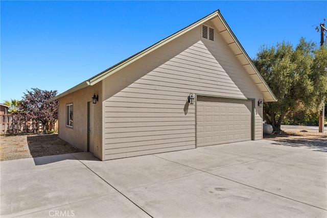 view of home's exterior with a garage